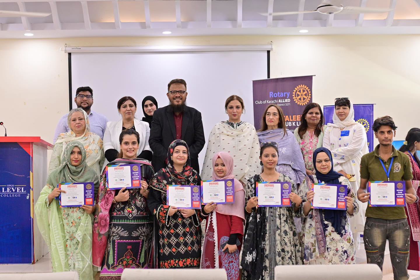 Participants receiving certificates after the AI tools session