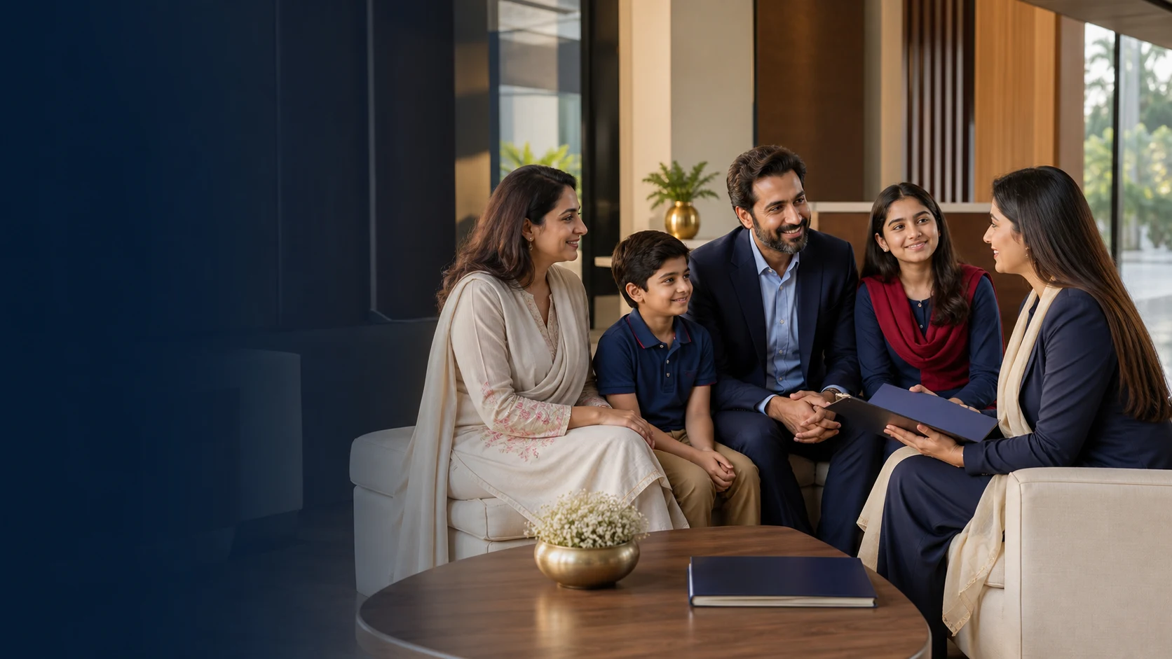 A family speaking with an admissions counsellor about choosing the right school programme