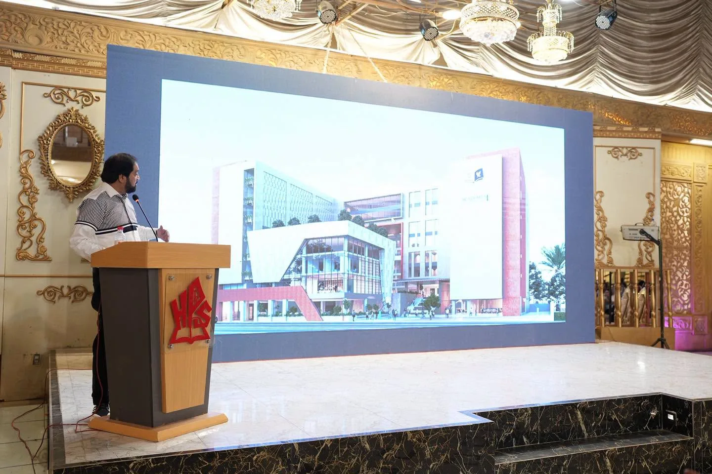 A speaker sharing a future-learning concept with educators